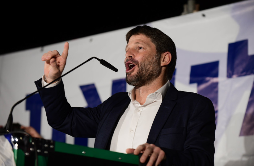  Head of the Religious Zionist Party MK Bezalel Smotrich speaks during a rally against the Israeli government in Tel Aviv, December 7, 2021.  (photo credit: TOMER NEUBERG/FLASH90)
