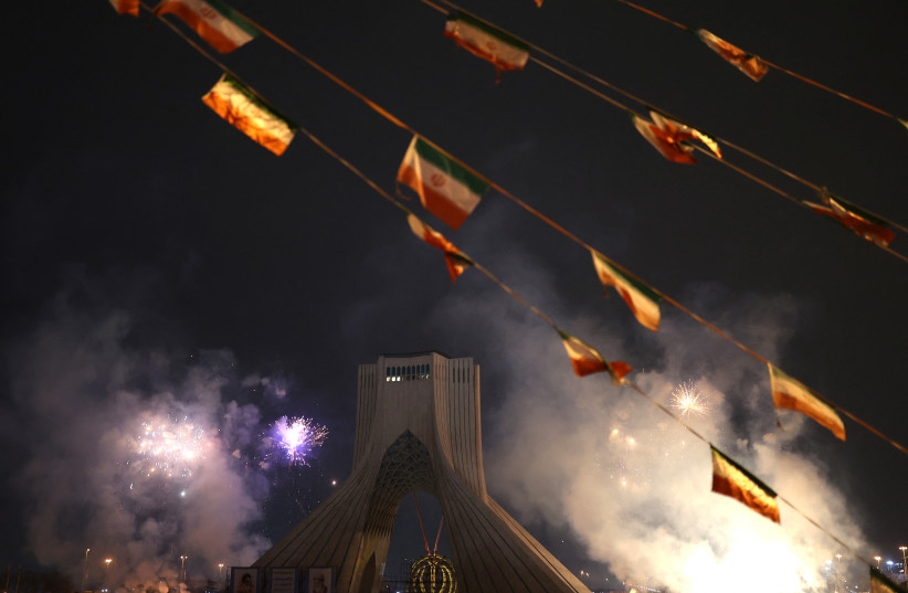  Fireworks are set off on the occasion of the 43rd anniversary of the Islamic Revolution around Azadi Tower in Tehran, Iran, February 10, 2022.  (photo credit: MAJID ASGARIPOUR/WANA (WEST ASIA NEWS AGENCY) VIA REUTERS)