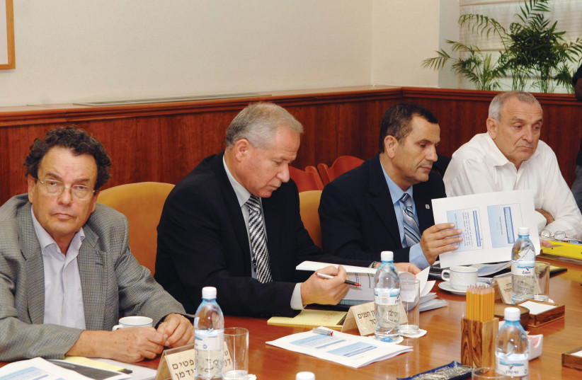  FROM LEFT: Daniel Friedmann, Avi Dichter, Yaakov Edri and Yitzhak Aharonovitch in a weekly cabinet meeting at the Prime Minister’s Office in Jerusalem in 2007.  (photo credit: AMOS BEN-GERSHOM/GPO)