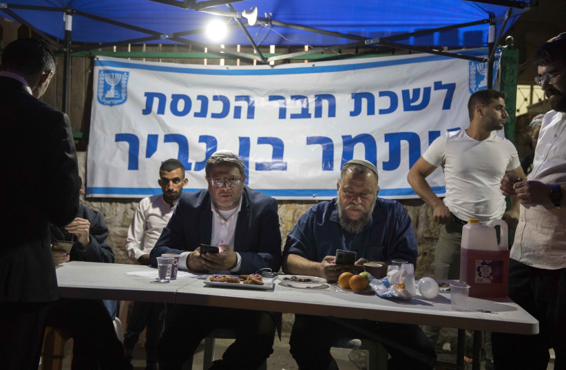  MK Itamar Ben Gvir seen with Lehava chairman Benzi Gopstein during a protest against Israel's plan to demolish some houses of Palestinians in the East Jerusalem neighborhood of Sheikh Jarrah on May 6, 2021 (credit: OLIVIER FITOUSSI/FLASH90)
