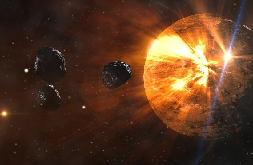  Three asteroids are seen in space in this artistic illustration. (credit: PIXABAY)
