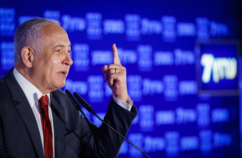  Head of opposition and head of the Likud party Benjamin Netanyahu speaks at a Conference of the 'Besheva' group in Jerusalem, on February 8, 2022.  (photo credit: OLIVIER FITOUSSI/FLASH90)