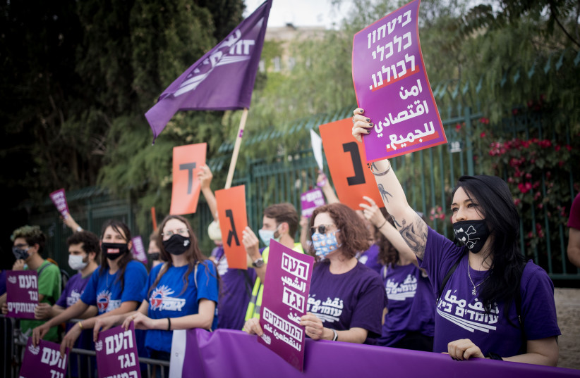  Members of the "Standing Together" movement protest for equal rights of financial support, outside the Israeli parliament on May 14, 2020.  (photo credit: YONATAN SINDEL/FLASH90)