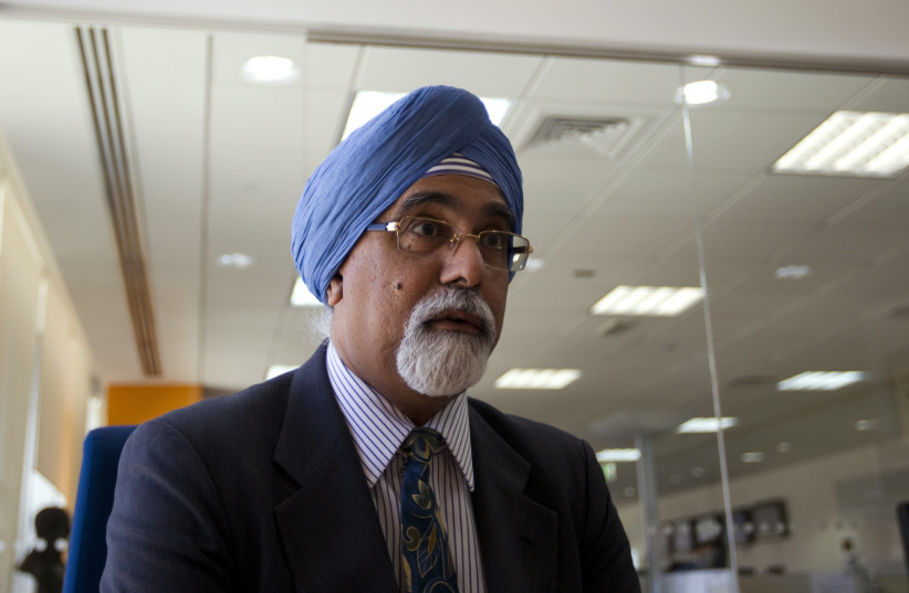  Gurjit Singh, chief development officer of Aldar Properties, attends a meeting with Reuters correspondents during the Reuters Middle East Investment Summit in Dubai October 28, 2013.  (credit: REUTERS/CAREN FIROUZ)