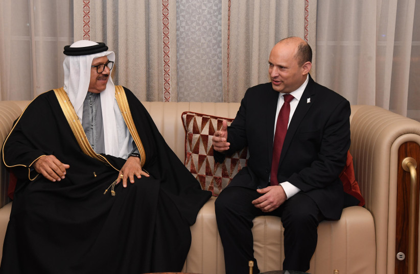  Israeli Prime Minister Naftali Bennett is seen meeting with Bahraini officials in Manama, after being the first Israeli prime minister in the Gulf Arab state, on February 14, 2022. (credit: HAIM ZACH/GPO)
