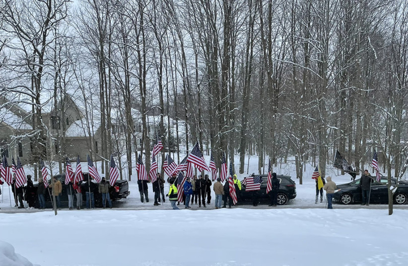  A group of men protest outside of Rep. Casey Weinstein’s home. (photo credit: COURTESY/CLEVELAND JEWISH NEWS)