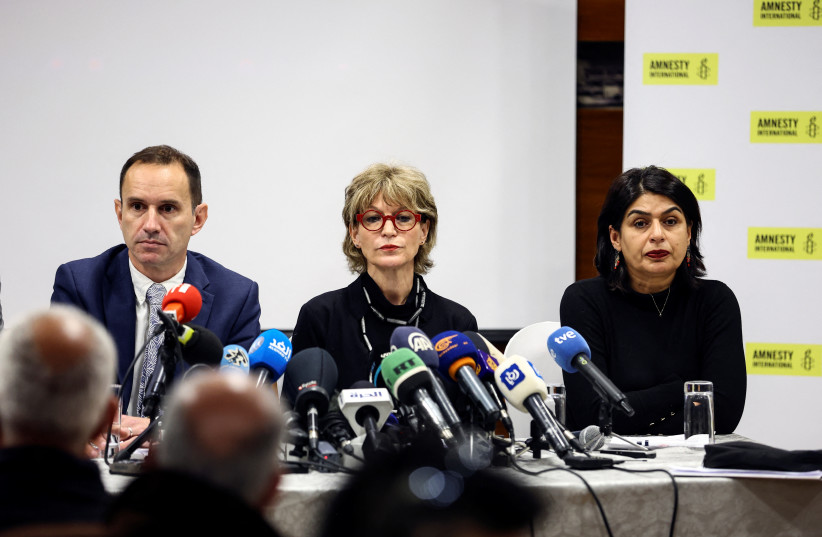  Amnesty International holds a press conference to announce its 211-page report named "Israel's Apartheid Against Palestinians: Cruel System of Domination and Crime Against Humanity" in East Jerusalem (photo credit: REUTERS/Ronen Zvulun)