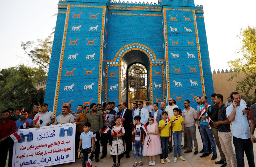 Iraqis celebrate after UNESCO designated ancient city of Babylon as World Heritage Site in July of 2019 (photo credit: REUTERS/THAIER AL-SUDANI)