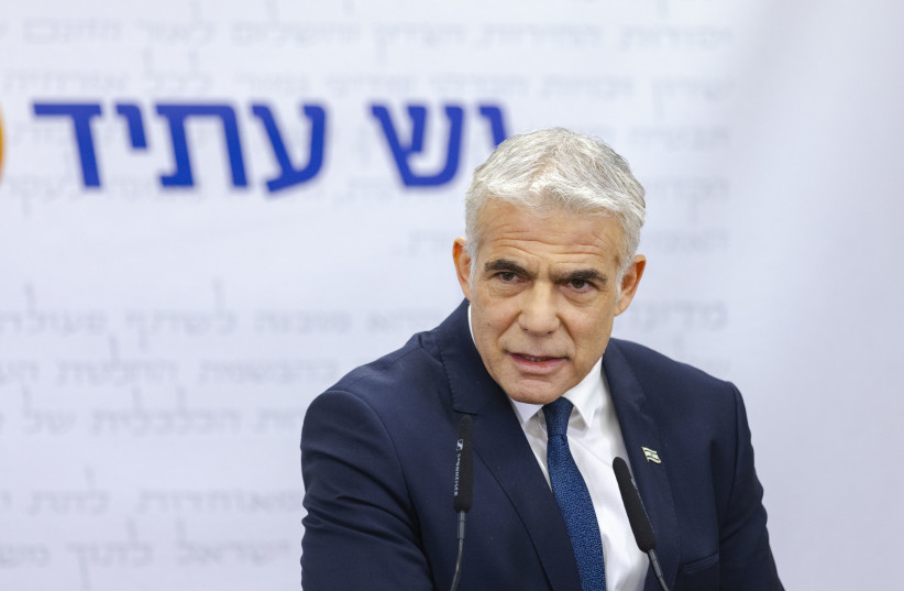  Israeli Foreign Minister and Head of the Yesh Atid party Yair Lapid speaks during a faction meeting at the Knesset, the Israeli parliament in Jerusalem, on February 14, 2022. (photo credit: OLIVIER FITOUSSI/FLASH90)
