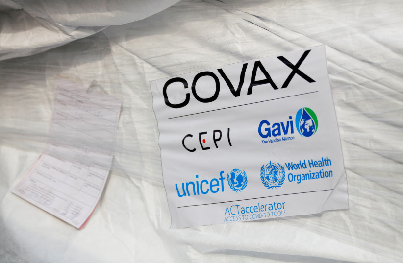  A pack of AstraZeneca/Oxford vaccines is seen as the country receives its first batch of coronavirus disease (COVID-19) vaccines under COVAX scheme, at the international airtport of Accra, Ghana February 24, 2021.  (credit: FRANCIS KOKOROKO/REUTERS)