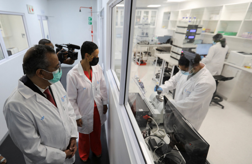  World Health Organization Director-General Tedros Adhanom Ghebreyesus and Belgium's Minister of Development Cooperation Meryame Kitir visit a WHO-backed mRNA vaccine hub, in Cape Town, South Africa, February 11, 2022.  (credit: REUTERS/Shelley Christians)
