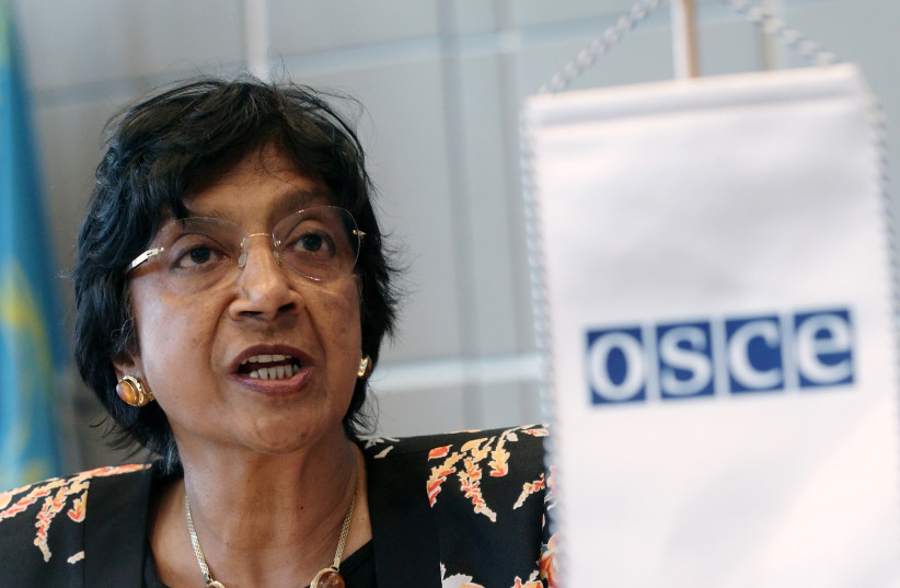  U.N. High Commissioner for Human Rights Navi Pillay addresses the OSCE permament council in Vienna July 3, 2014. (credit: REUTERS/HEINZ-PETER BADER)