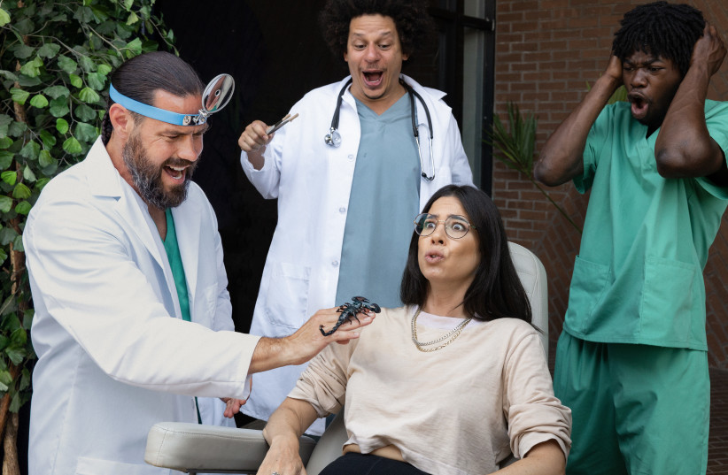  Rachel Wolfson in an uncomfortable scene with, from left, Chris Pontius, Eric Andre, and Eric Manaka — and a scorpion — in "Jackass: Forever."  (photo credit: PARAMOUNT PICTURES)