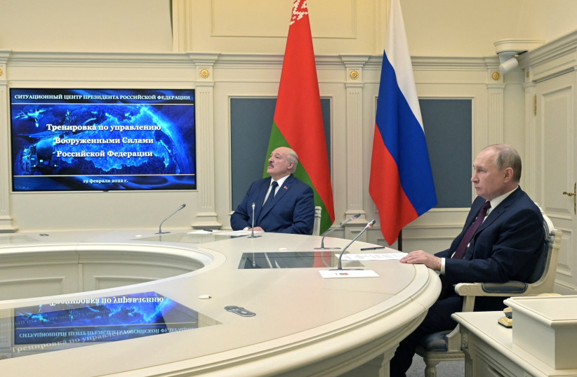  Russian President Vladimir Putin and Belarusian President Alexander Lukashenko observe training launches of ballistic missiles as part of the exercise of the strategic deterrence force, in Moscow, Russia February 19, 2022.  (photo credit: SPUTNIK/ALEKSEY NIKOLSKYI/KREMLIN VIA REUTERS)