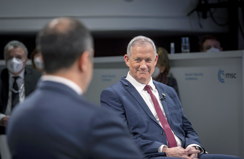   Israel's Defense Minister Benny Gantz is seen addressing a townhall in Munich, Germany, on February 20, 2022. (photo credit: Munich Security Conference)