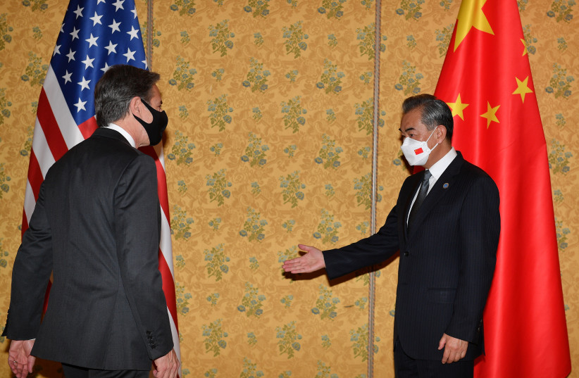  U.S. Secretary of State Antony Blinken meets Chinese Foreign Minister Wang Yi on the sidelines of the G20 summit in Rome, Italy October 31, 2021. (credit: Tiziana Fabi/Pool via REUTERS)