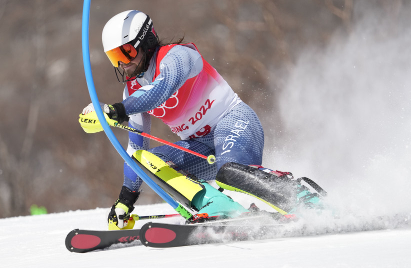  ISRAELI SKIER Barnabas Szollos competes on the slopes at Yanqing Alpine Skiing Centre en route to a 23rd-place finish in the men’s Slalom event at the Beijing 2022 Olympic Winter Games. Szollos was one of the blue-and-white highlights of the Games. (photo credit:  ERIC BOLTE/USA TODAY SPORTS)