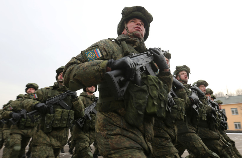 Russian soldiers march in Almaty, Kazakhstan, January 13, 2022 (photo credit: REUTERS/PAVEL MIKHEYEV)