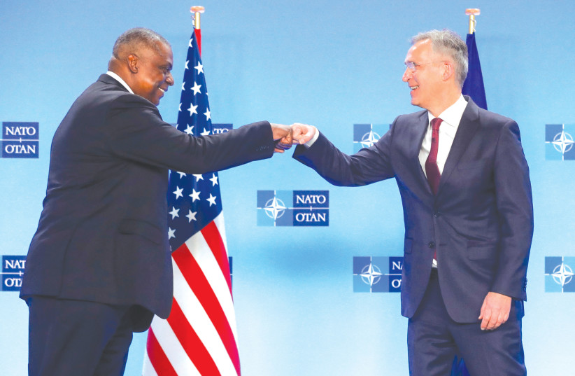  US DEFENSE Secretary Lloyd Austin is welcomed by NATO Secretary General Jens Stoltenberg to a meeting of defense ministers at NATO headquarters in Brussels last week. (photo credit: STEPHANIE LECOCQ/REUTERS)