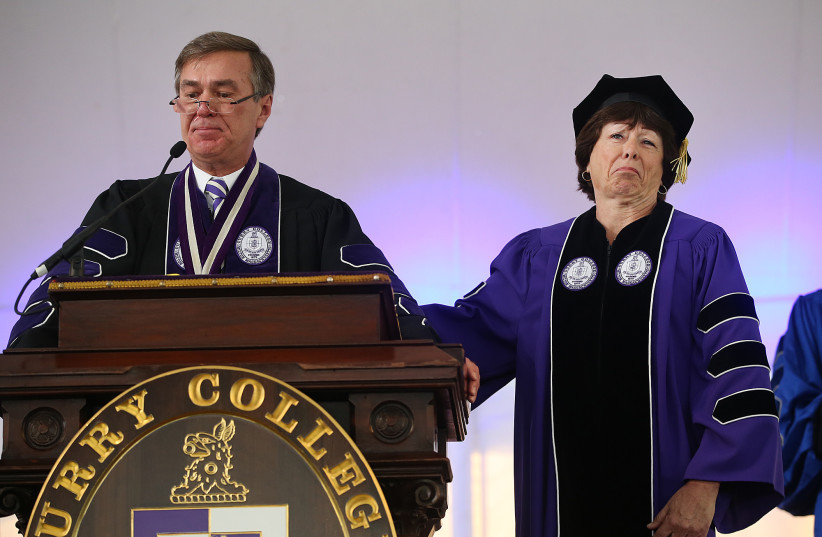  Curry College President Kenneth Quigley stands with 2017 Honorary Doctorate recipient Karen Daley at Curry College in Milton, Massachusetts, May 21, 2017.  (credit: Nancy Lane/MediaNews Group/Boston Herald via Getty Images)