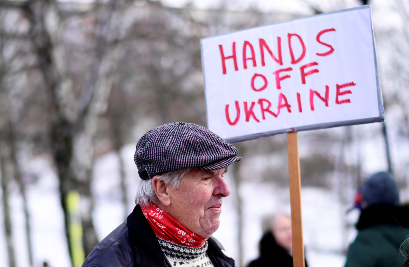  Protests against Russia's actions in Ukraine outside the Russian embassy, in Stockholm (photo credit: TT News Agency/Paul Wennerholm via Reuters)