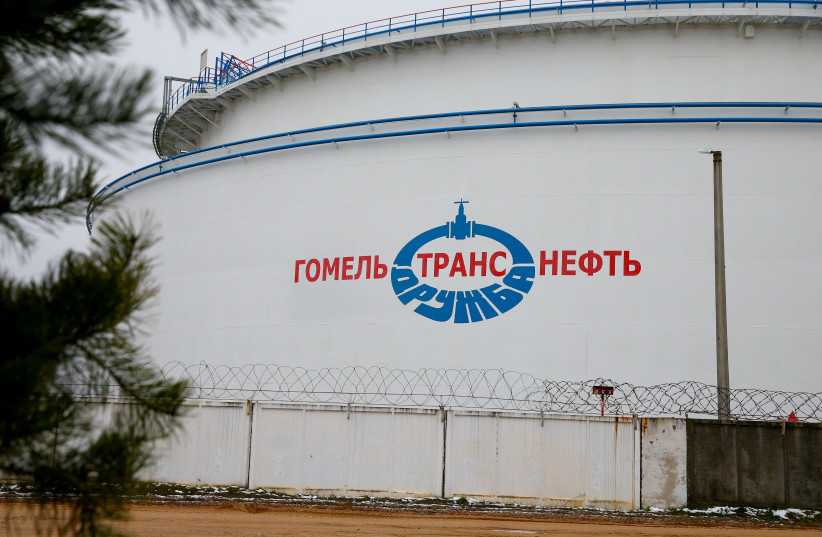  A storage tank is pictured at the Gomel Transneft oil pumping station, which moves crude through the Druzhba pipeline westwards to Europe, near Mozyr, Belarus January 4, 2020.  (credit: VASILY FEDOSENKO / REUTERS)