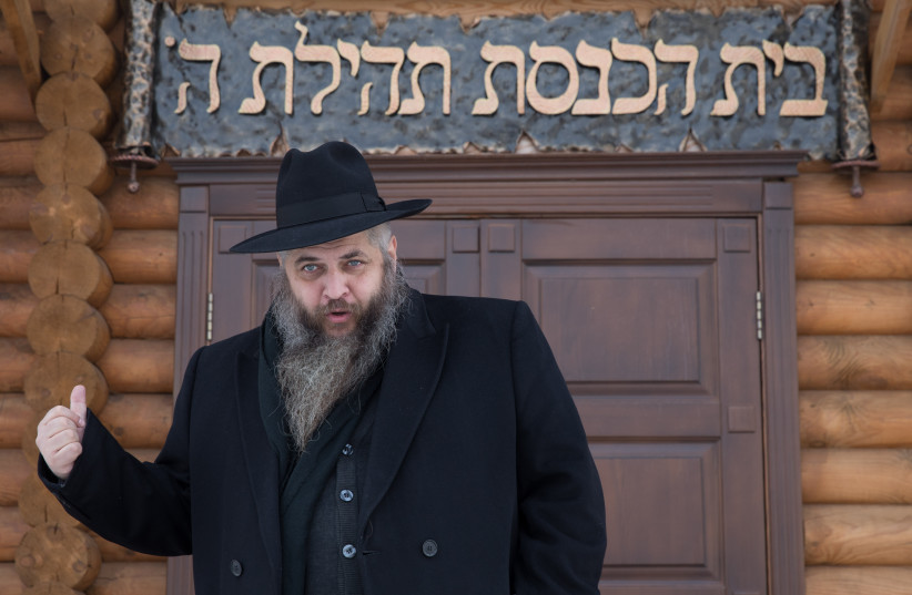  Chabbad Rabbi Moshe Reuven Asman stands outside the Chabad Tehila synagoguein the renewing Jewish community near the village of Antebka near the city of Kiev in Ukraine, on February 14, 2018. (credit: NATI SHOHAT/FLASH90)