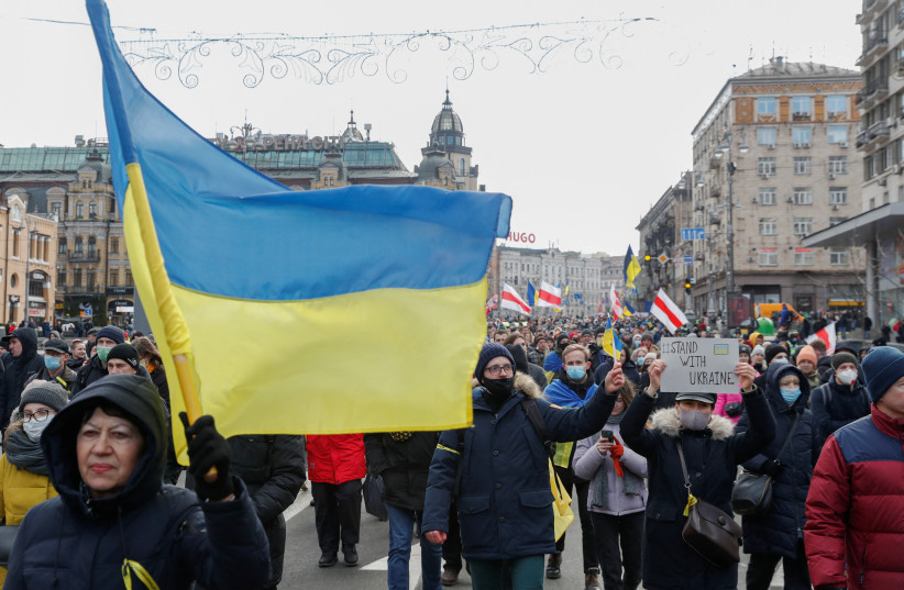  Ukrainian s take part in a Unity March, a procession to demonstrate patriotic spirit amid growing tensions with Russia, in Kyiv on February 12, 2022. (credit: VALENTYN OGIRENKO/REUTERS)