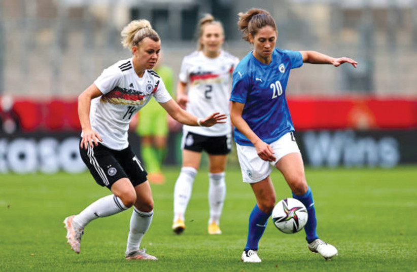  The Israel women's national soccer team, seen here playing Germany, was established in 1997. (photo credit: SOFIAN SOLTANI)