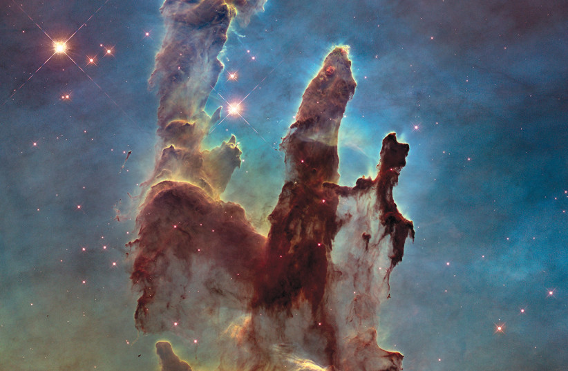  The Pillars of Creation, within the Eagle nebula. (credit: ESA/HUBBLE/NASA)