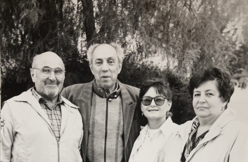  AFTER A five-hour-long gathering of heart-wrenching discoveries, (L to R) Charles (husband of Yocheved), Lev, Yocheved and Valia (Lev’s wife) stepped into the garden for a photo to mark the event. (credit: Yochi Ticho collection)