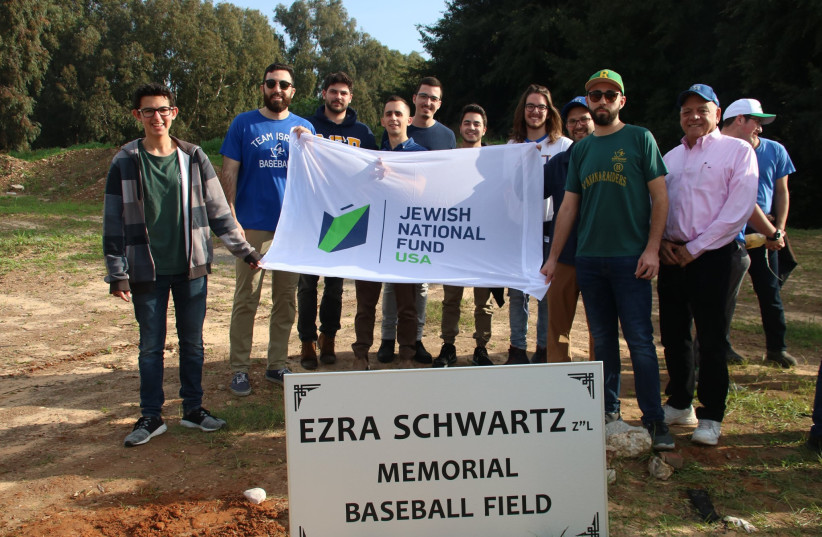  The dedication of the Ezra Schwartz Memorial Field in Ra'anana took place in the presence of Ra'anana Mayor Chaim Broide, Team Israel General Manager Peter Kurz, the Schwartz family, members of JNF-USA’s Team Israel Olympic Baseball squad and other dignitaries. (photo credit: JNF-USA)