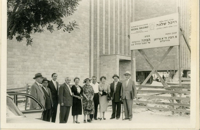  SIR ISAAC WOLFSON (fourth from L) at 1957 reception in his honor during construction of Heichal Shlomo.  (credit: Museum of Jewish Art Archive Collection)