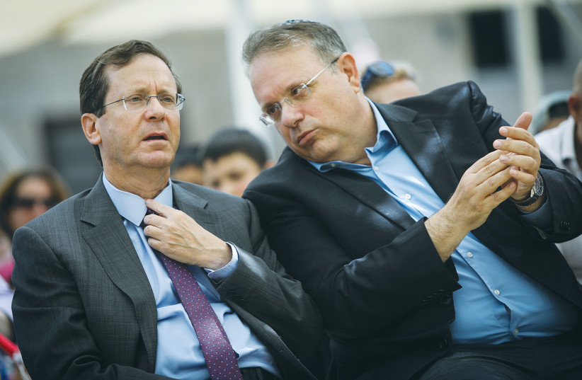  IN JULY, newly-elected Israeli president and outgoing chairman of the Jewish Agency Isaac Herzog and chairman of the World Zionist Organization Yaakov Hagoel attend a farewell ceremony held in Herzog’s honor at the Jewish Agency in Jerusalem.  (photo credit: NOAM REVKIN FENTON/FLASH90)