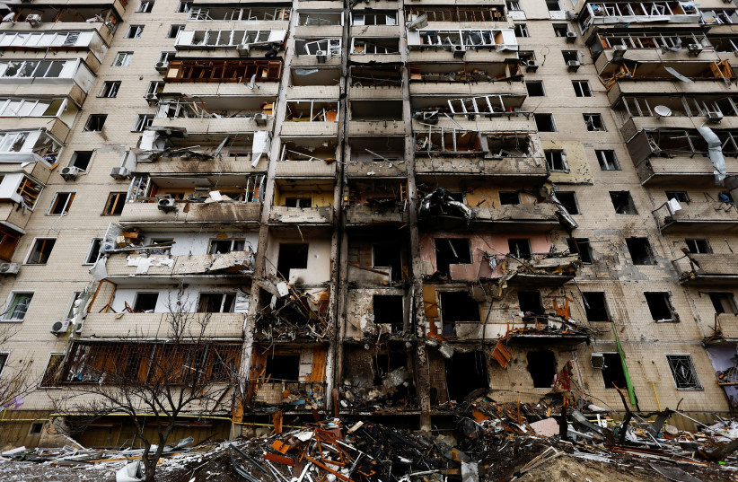 A damaged residential building is seen, after Russia launched a massive military operation against Ukraine, in Kyiv, Ukraine February 25, 2022. (credit: UMIT BEKTAS/REUTERS)