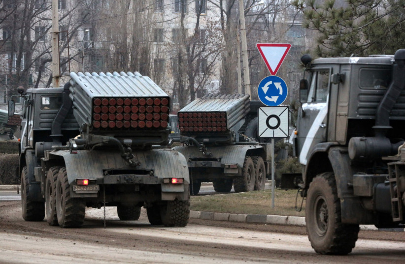  Russian army military vehicles are seen in Armyansk, Crimea, on February 25, 2022 (credit: STRINGER/AFP VIA GETTY IMAGES)
