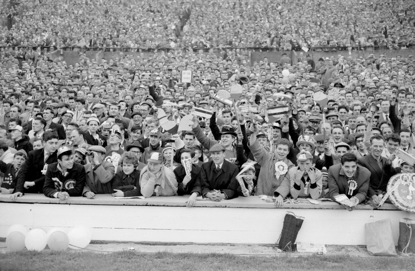  Tightly packed supporters of Leicester City and Tottenham Hotspur shown at Wembley Stadium in London before the kick-off of the 1961 FA Cup Final. Tottenham fans have long called themselves the ''Yid Army.'' (credit: PA IMAGES VIA GETTY IMAGES)
