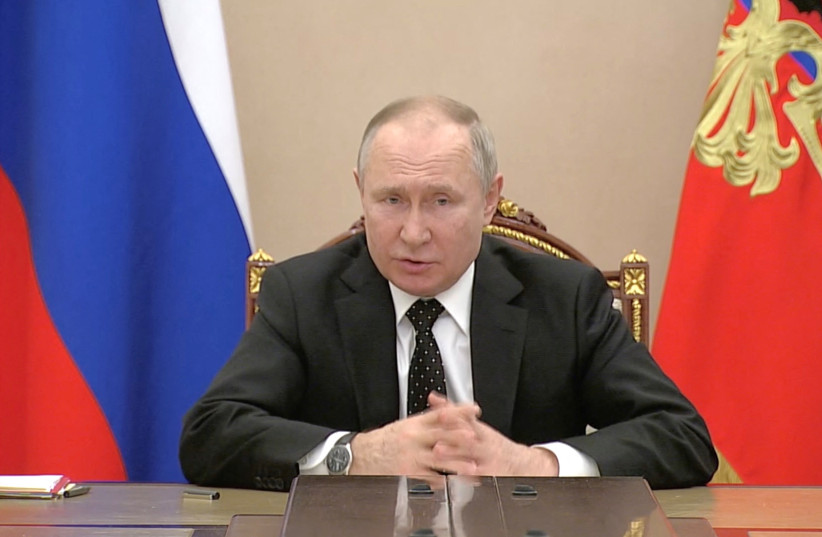  Russian President Vladimir Putin speaks about putting nuclear deterrence forces on high alert, in this still image obtained from a video, in Moscow, Russia, February 27, 2022. (photo credit: Russian Pool/Reuters TV via REUTERS ATTENTION EDITORS)