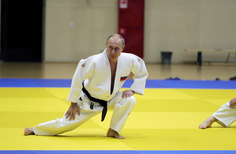  Russian President Vladimir Putin attends a judo training session at the Yug-Sport sport and training complex in the Black sea resort of Sochi, Russia, February 14, 2019. (credit: Sputnik/Mikhael Klimentyev/Kremlin via REUTERS)