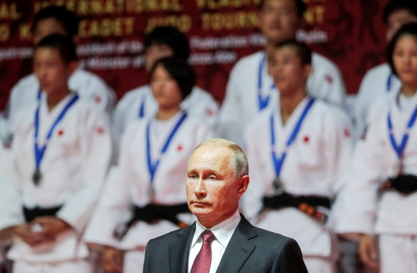  Russian President Vladimir Putin takes part in a ceremony to award prize winners of an international judo tournament on the sidelines of the Eastern Economic Forum in Vladivostok, Russia September 12, 2018. (credit: Mikhail Metzel/TASS Host Photo Agency/Pool via REUTERS)