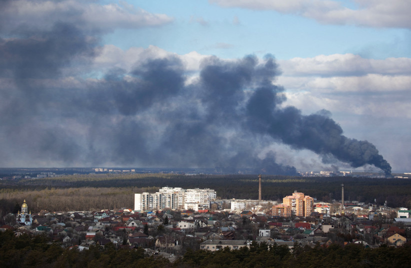  Smoke rising after shelling on the outskirts of the city is pictured from Kyiv, Ukraine February 27, 2022.  (credit: Mykhailo Markiv/Reuters)