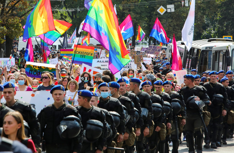  Law enforcement officers guard the Kharkiv Pride march organised in support of the LGBT community in Kharkiv, Ukraine September 12, 2021. (credit: REUTERS/VYACHESLAV MADIYEVSKYY)