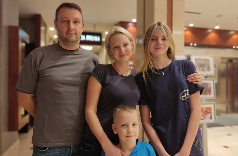  Natalia and Andre Forys and their children Arina, 12, and Max, six, who escaped the fighting in Ukraine, February 28, 2022. (photo credit: Zvika Klein)