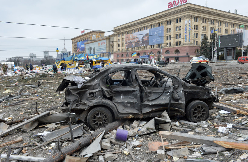  A view of the square outside the damaged local city hall of Kharkiv on March 1, 2022, destroyed as a result of Russian troop shelling. (photo credit: SERGEY BOBOK/AFP via Getty Images)