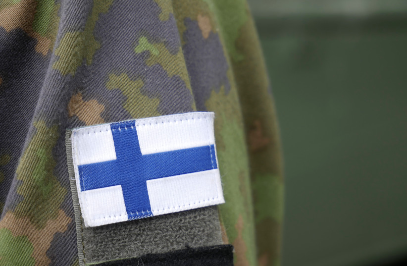  Flag of Finland on an army uniform. (photo credit: Santeri Viinamäki/Wikimedia Commons)