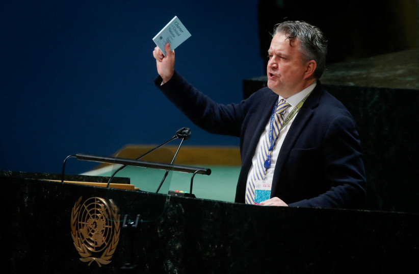  Ukrainian Ambassador to the United Nations Sergiy Kyslytsya holds the Charter of the United Nations as he speaks at the 11th emergency special session of the 193-member UN General Assembly on Russia's invasion of Ukraine, at the United Nations Headquarters in Manhattan, New York City, US, March 2,  (credit: REUTERS/EDUARDO MUNOZ)