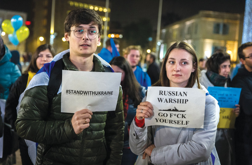  PROTESTERS MAKE their feelings against the Russian invasion known outside City Hall, Feb. 28.  (photo credit: OLIVIER FITOUSSI/FLASH90)