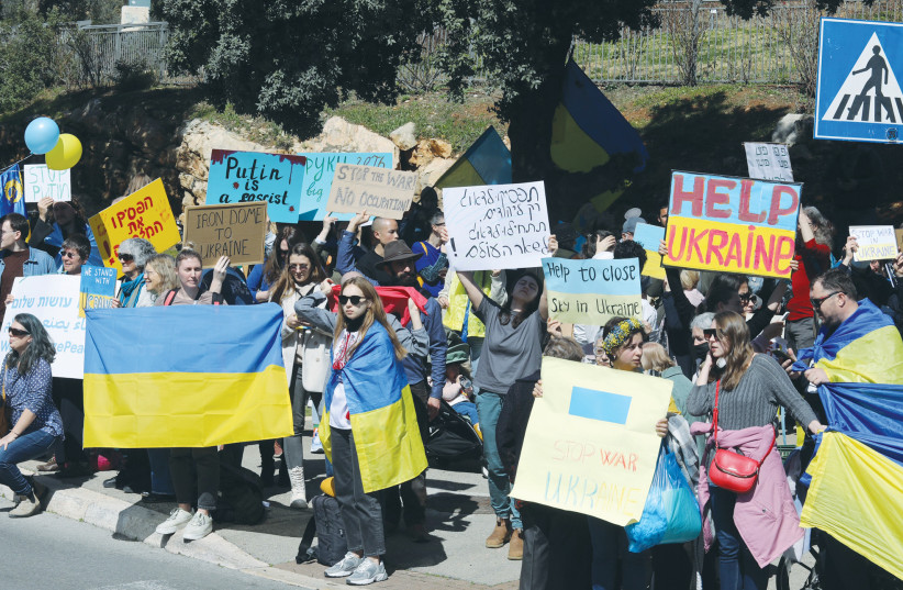  PEOPLE PARTICIPATE in a solidarity rally for Ukraine, outside the Knesset in Jerusalem. (photo credit: MARC ISRAEL SELLEM/THE JERUSALEM POST)