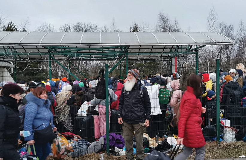  UKRAINIAN REFUGEES this week at the border with Poland in Medyka. (credit: Hilik Magnus/Passport Card)