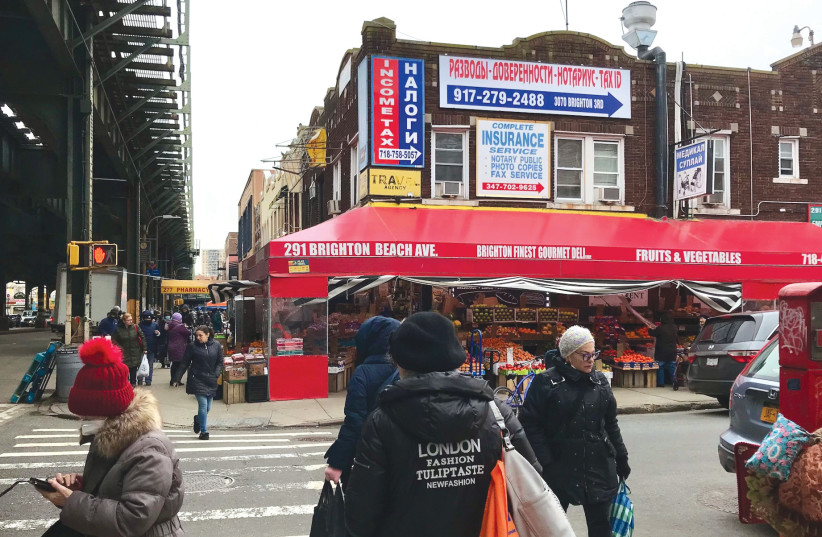  STORES, PHARMACIES, social services and restaurants serve Russian-speaking immigrants on Brighton Beach Avenue, a popular commercial district that runs parallel to the Coney Island boardwalk in Brooklyn. (credit: JULIA GERGELY/JTA)
